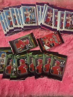 Nfl cards and more 27 packs $100