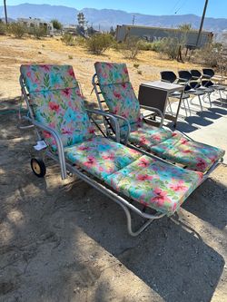 Mid-century modern aluminum lounge chairs