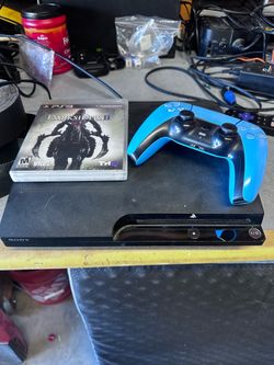 Sony PS3 Slim Console and Game