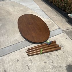 Oval wooden dining room table