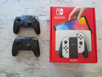 Nintendo Switch OLED + Two Pro Controllers
