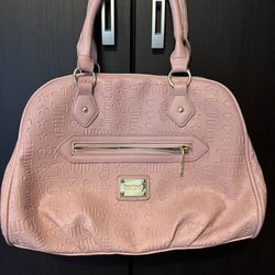 juicy couture bag PINK Los Angeles California bag  In great condition. Very unique. Lots of pockets and zippers. Sizes 12x10. Lots of room inside. 