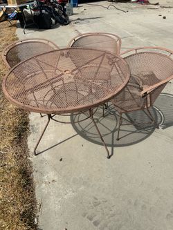 Wrought iron patio Table with 3 chairs