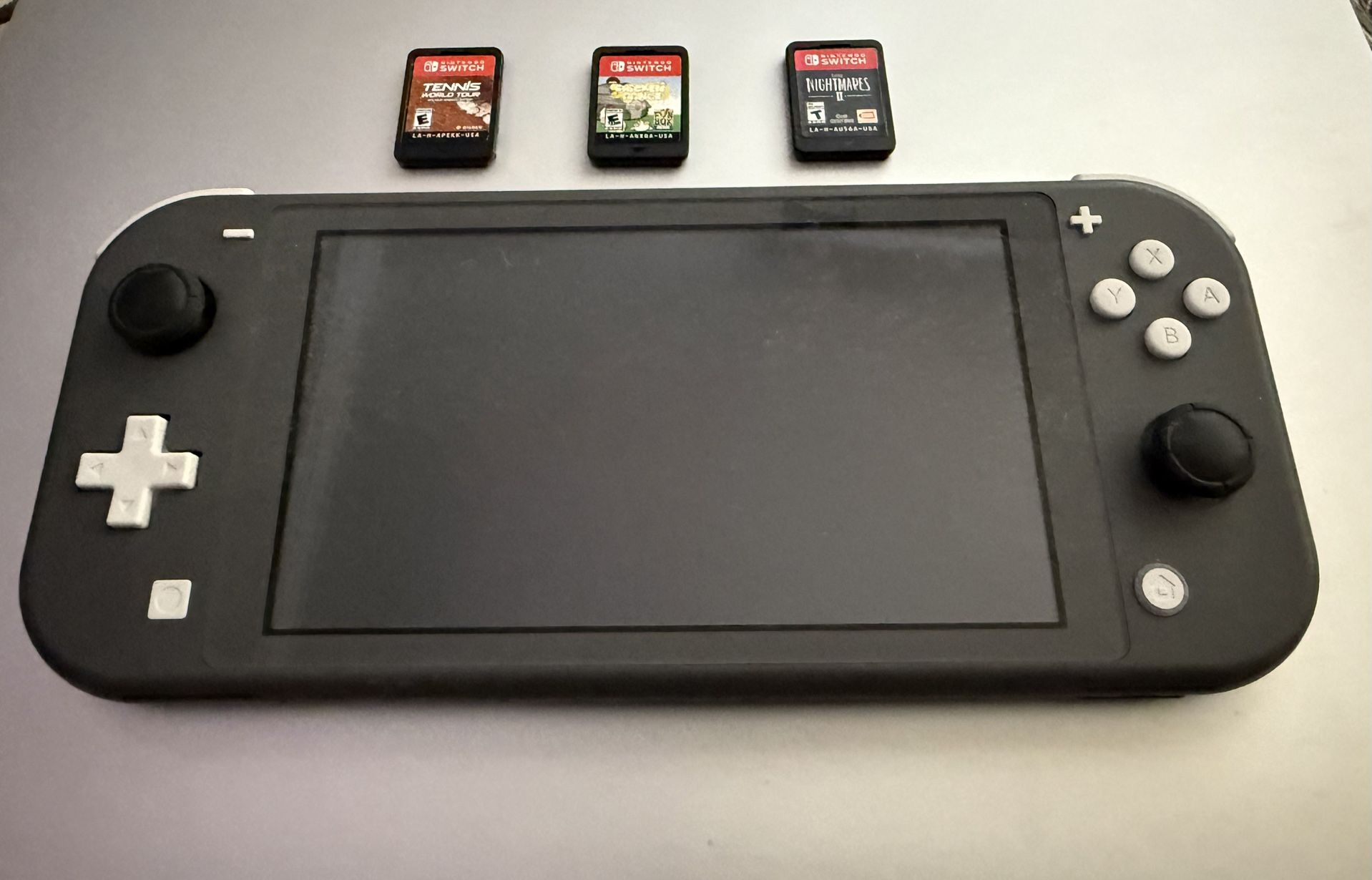 Nintendo Switch Lite With 3 Games And Charger