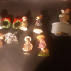 7 Figurines And A Music Box