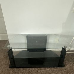 glass and black entertainment center
