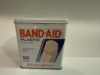 vintage tin of Band-Aid Plastic Bandages by Johnson & Johnson. The tin contains 50 sterile bandages of assorted sizes.
