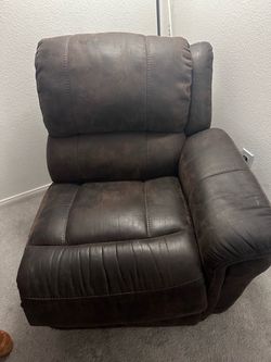 Electric brown leather reclining with USB port For ($17)
