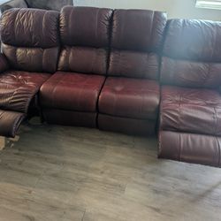 Dark Red Leather Couch $100