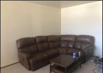 Dark brown leather reclining sectional movable pieces