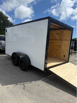 Trailer enclosed 7 x 14 polycore 0.80 it’s 2026 I have the title