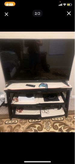 Selling Tv and Tv stand.