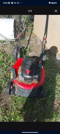 3 broken lawnmowers