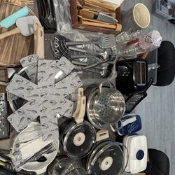 Big box: frying pans, pots, kettle, vegetable grater, spatulas, apron, containers, shot glasses, glasses, forks and spoons, knife sharpening,
