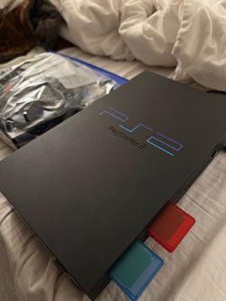 PS2 CONSOLE NEW CONDITION + ALL WIRES
