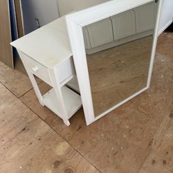 Two nightstands and mirror