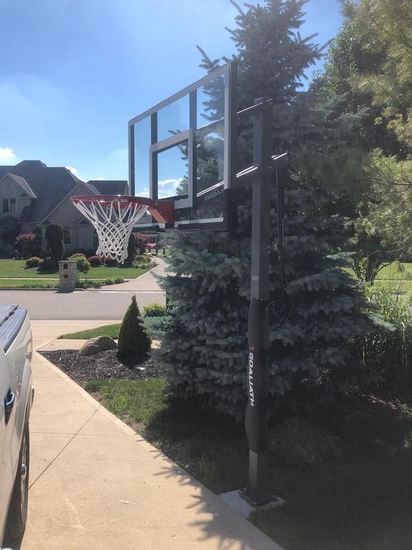 Goaliath 54 inch in ground basketball hoop, adjustable basketball court