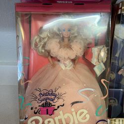 1991 Birthday Surprise Barbie doll (Product #3679) in its original box. The doll is wearing a peach-colored dress and was released by Mattel in 1991. 