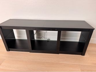 TV stand with glass shelving