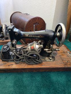 Vintage Mansion sewing machine in ornate case