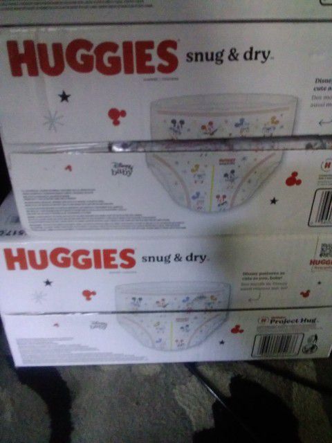 2 Boxes Size 4 Huggies