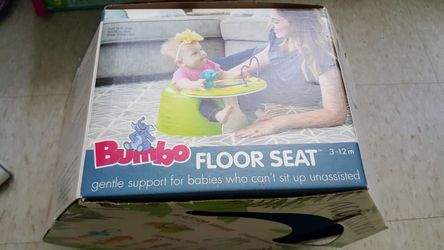 Floor seat for babies.. Open box