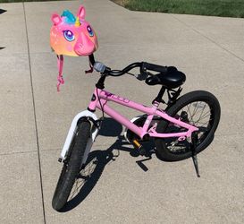 Pink Kid’s Bike With Unicorn Helmet