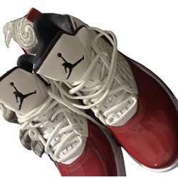 Jordan Maxin 200 sneakers in the White and Gym Red colorway.