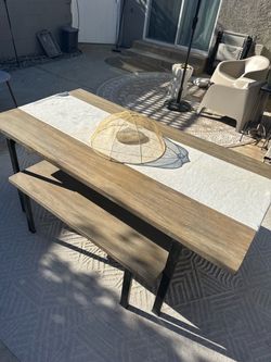 Large wood dining table with benches