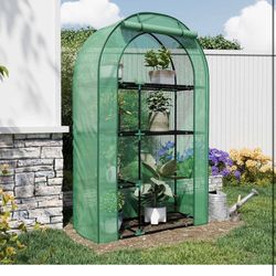 New in box 4-Tier Indoor/Outdoor Mini Greenhouse, 40" x 18" x 63" Portable Plant Starter for Herbs & Seedlings with Clear PE Cover, Tool-Free Assembly