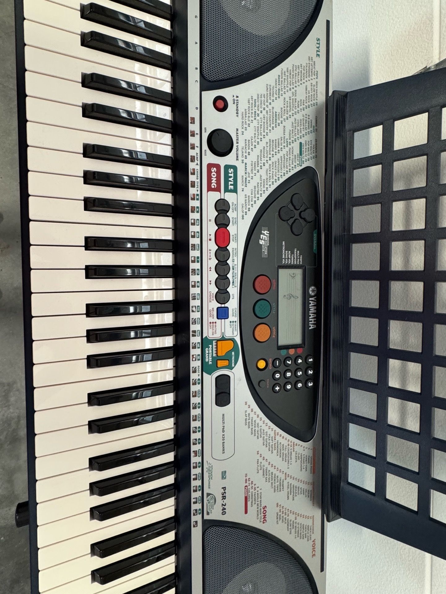 Electronic keyboard with adjustable stand