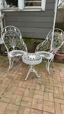 3 Pieces White Patio Cheers and table..