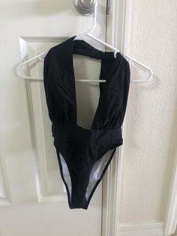New black one piece size small