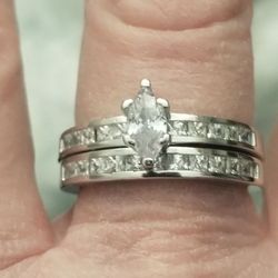 Solid 925 silver 2 piece wedding set with a marquise cut AAA cz in the middle and AAA white cz's on each side size 9.