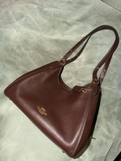 Brand new maple coach Erin
