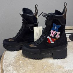  Louis Vuitton patchwork / heart-appliqué combat boots
