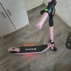 electric scooter for kids, in pink. 
