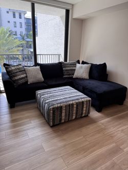 Black Sectional Sofa and Ottoman