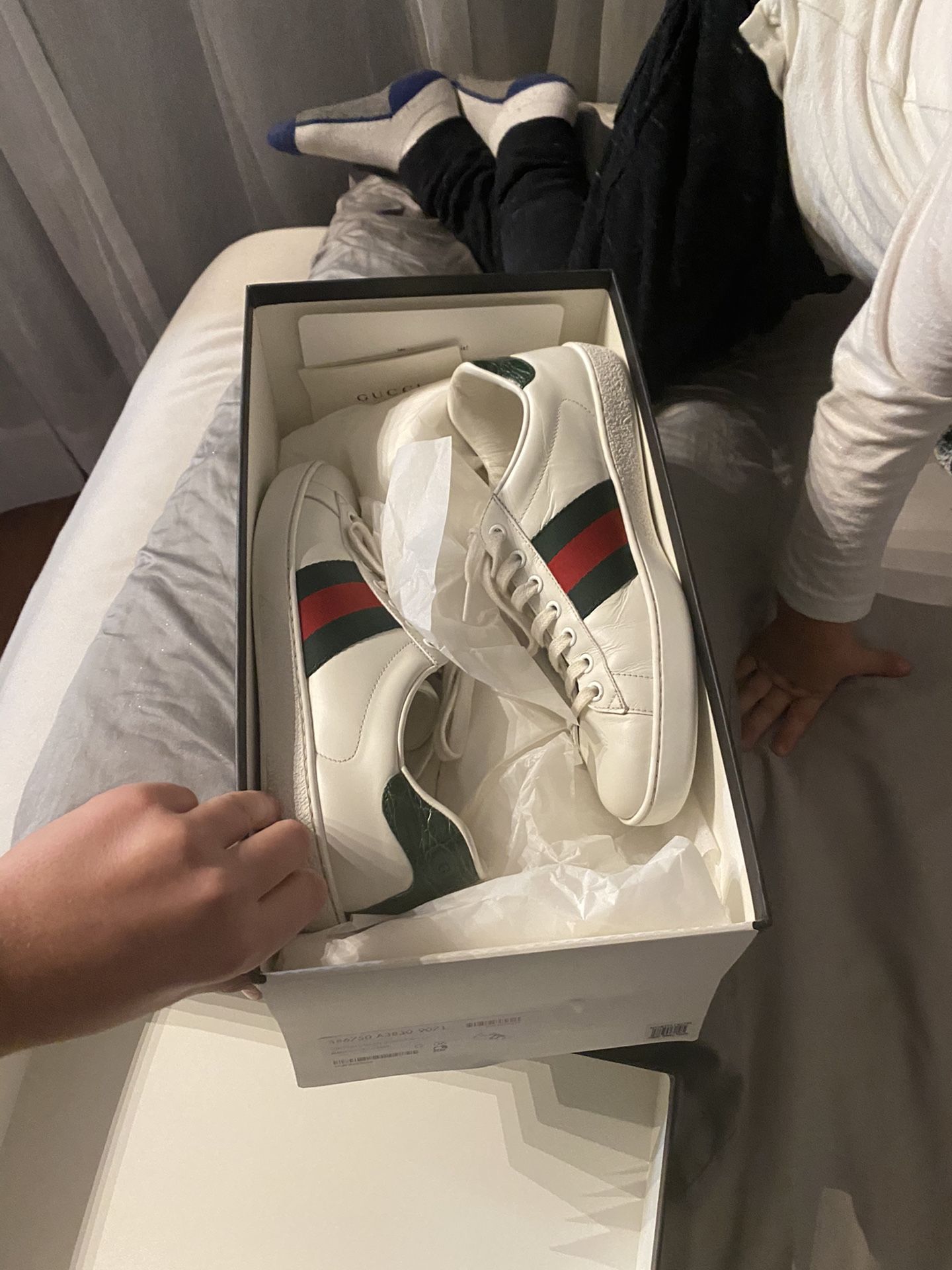 White Gucci’s shoes