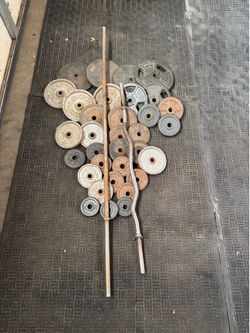 120lbs of standard weights plus cut bar and 6ft bar