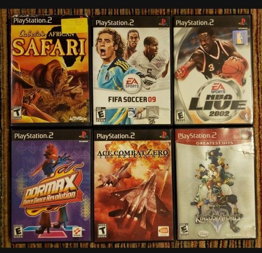 PS2 play station with 6 video games