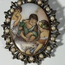 Rare Hand painted porcelain framed cameo brooch