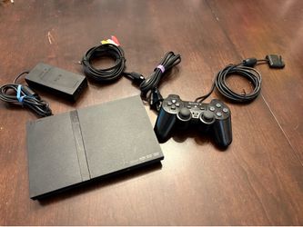 (Pending) PlayStation 2 Slim bundle with cables, controller, and voice of games