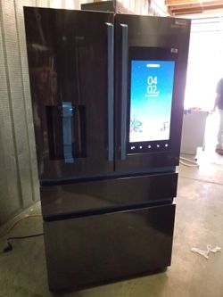 New refrigerator 4 door brand Samsung *screen*
