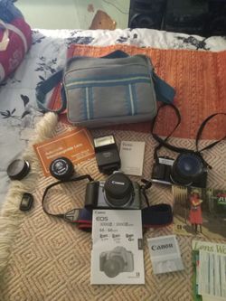 2) Film Type 35mm Cameras And Extras.