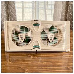 💨  Holmes Dual Blade Window Fan with Reversible Airflow Control