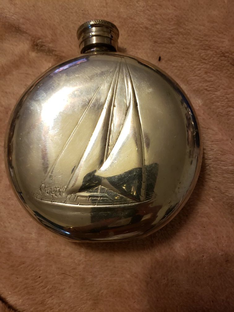 Beautiful flask with sailboat