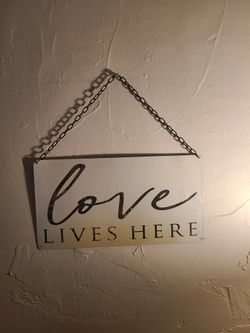 Love Lives Here Metal Sign 