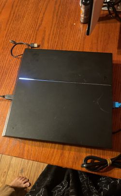 PS4 with a TV and games