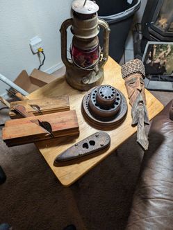 This is a great lot of some pretty cool rare antiques when you get the antique Chinese cuff and collar iron the drill bit holder the hand carved man t